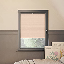 a Picture of a pink leto blush perfect fit blind in a modern bedroom