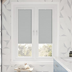 a grey perfect fit honeycomb blind in a modern bathroom, Stellar Gris