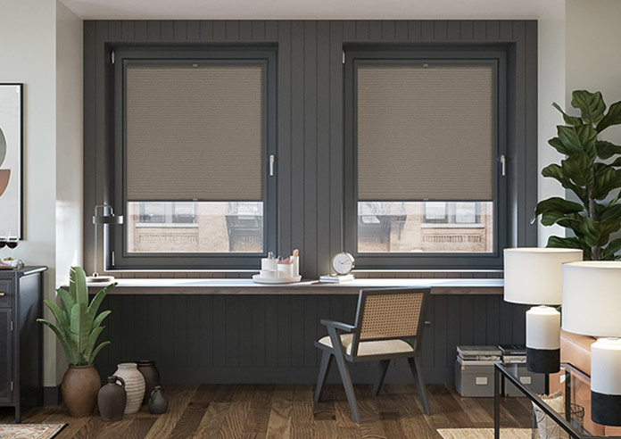 A Brown, honeycomb perfect fit blind in a dark contemporary office