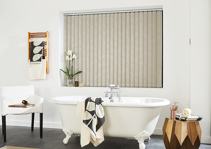 A brown patterned vertical blind in a modern bathroom
