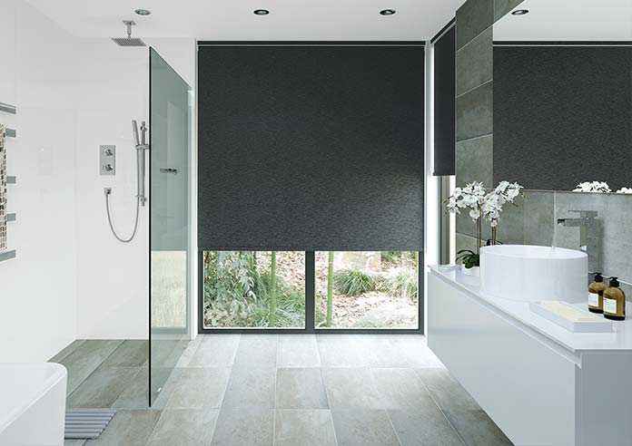 A black PVC waterproof blind adorns a bathroom sliding door. Modern in style.