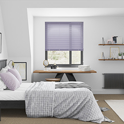 A bedroom with a beautiful purple aluminium venetian blind