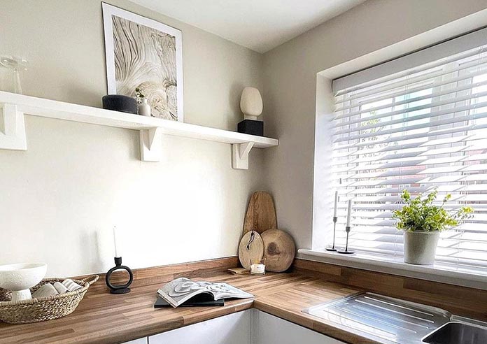 An image showing a wooden blind in a kitchen