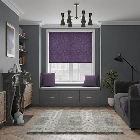 A purple floral patterned roller blind in a living room