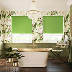 A set of lime green roller blinds in a maximalist decorated bathroom