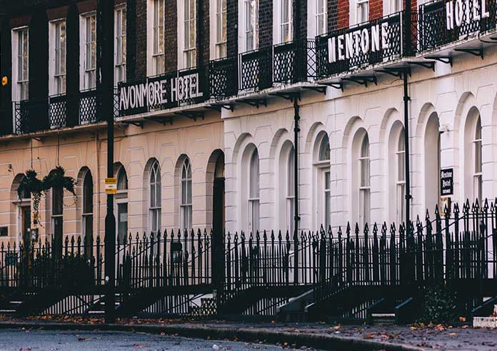 A photograph showing off a Victorian row of houses. Likely London or Bath
