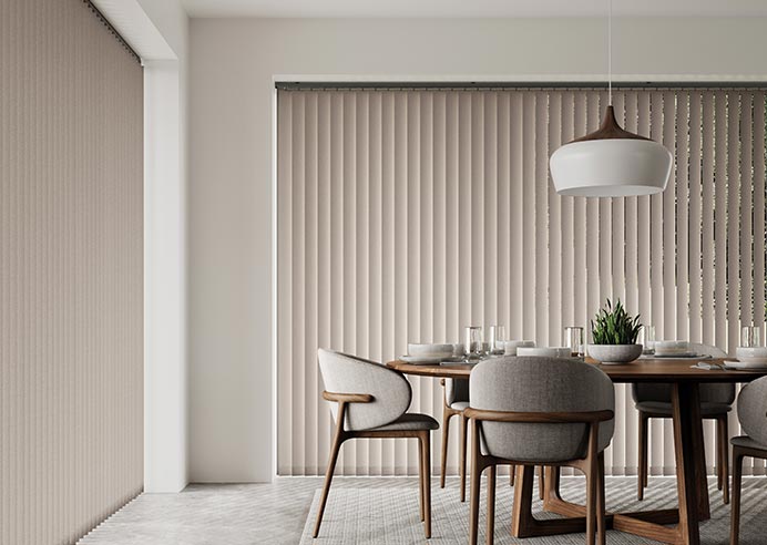 A taupe brown vertical bliind in amodern minimalist dining space.