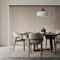 A taupe brown vertical bliind in amodern minimalist dining space.